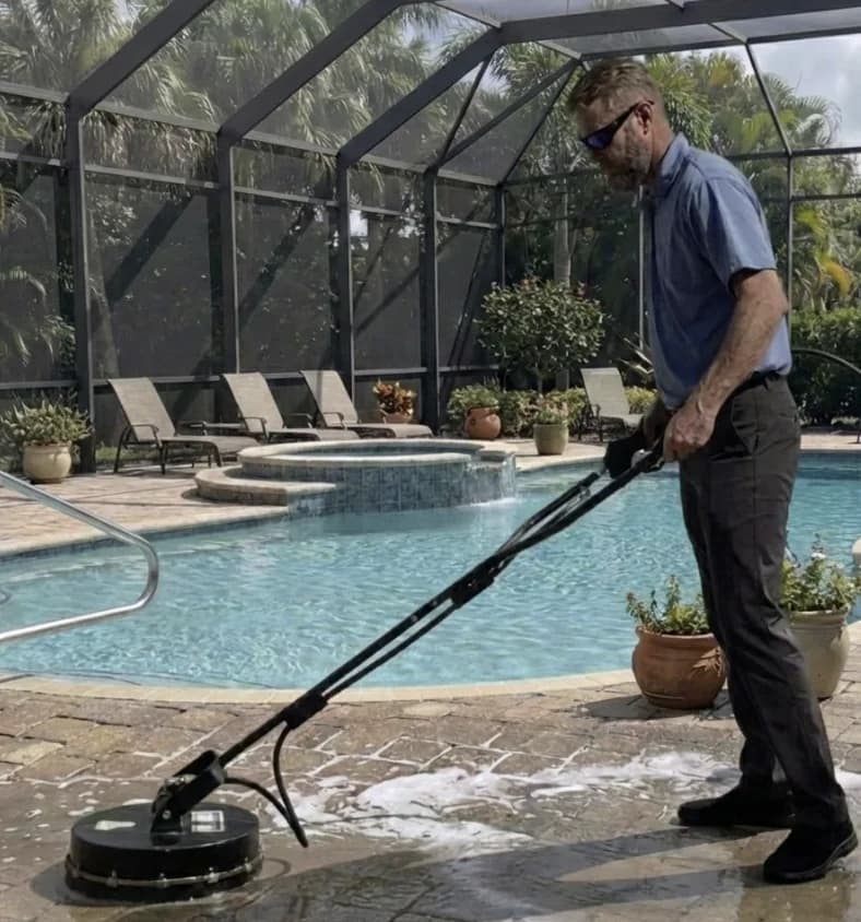 Steve cleaning a pool deck in Hudson, FL - Hudson Pressure Pros